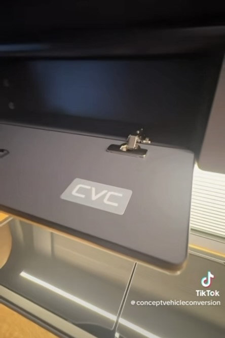 Real CVC camper interior with branded cabinet